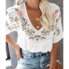 Azura Exchange Embroidered V Neck Crinkle Babydoll Blouse – L